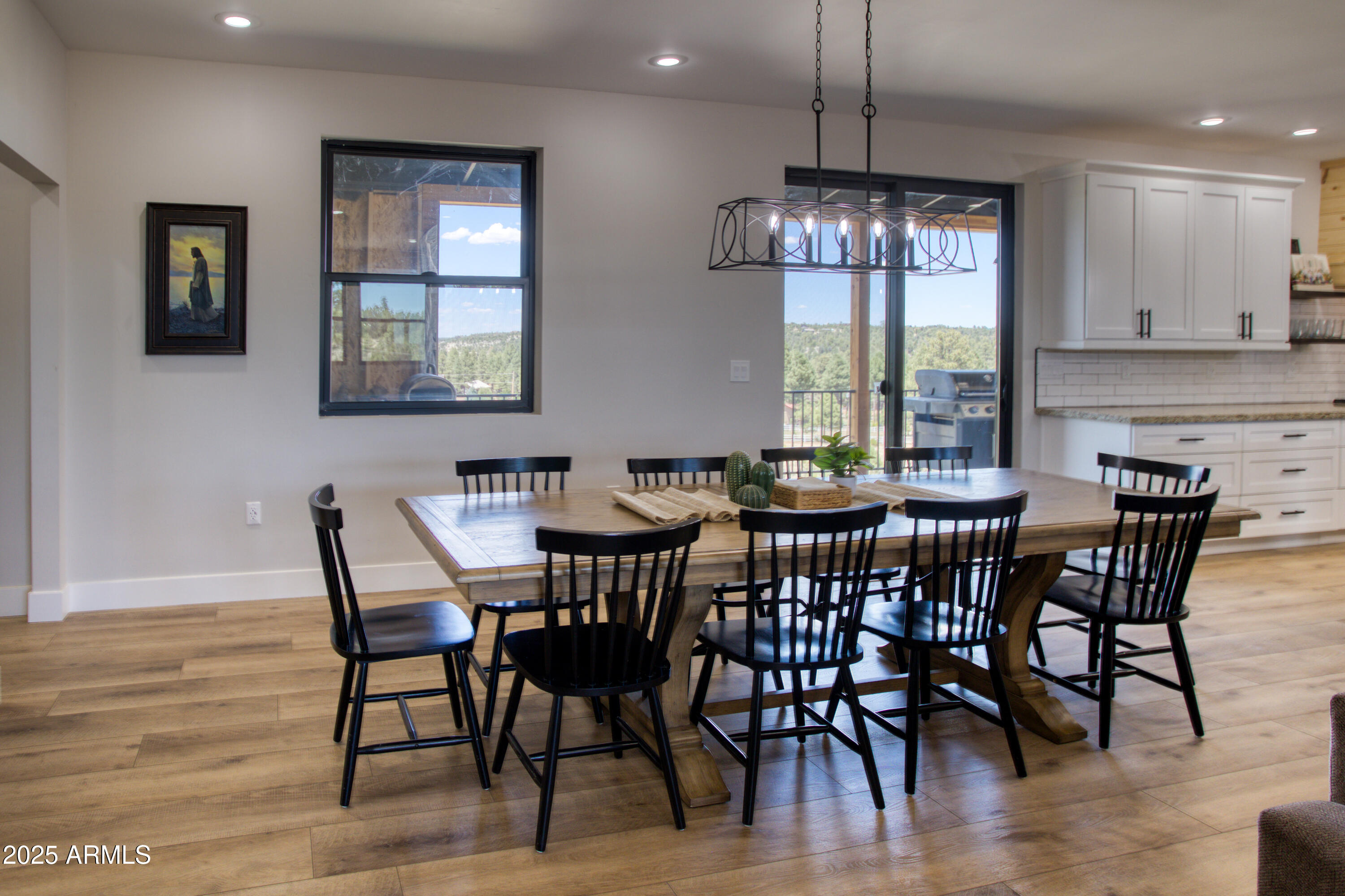 1850 Pinecone Heber, AZ 85928 - Photo 18 of 40 a view of a dining room with furniture window and wooden floor