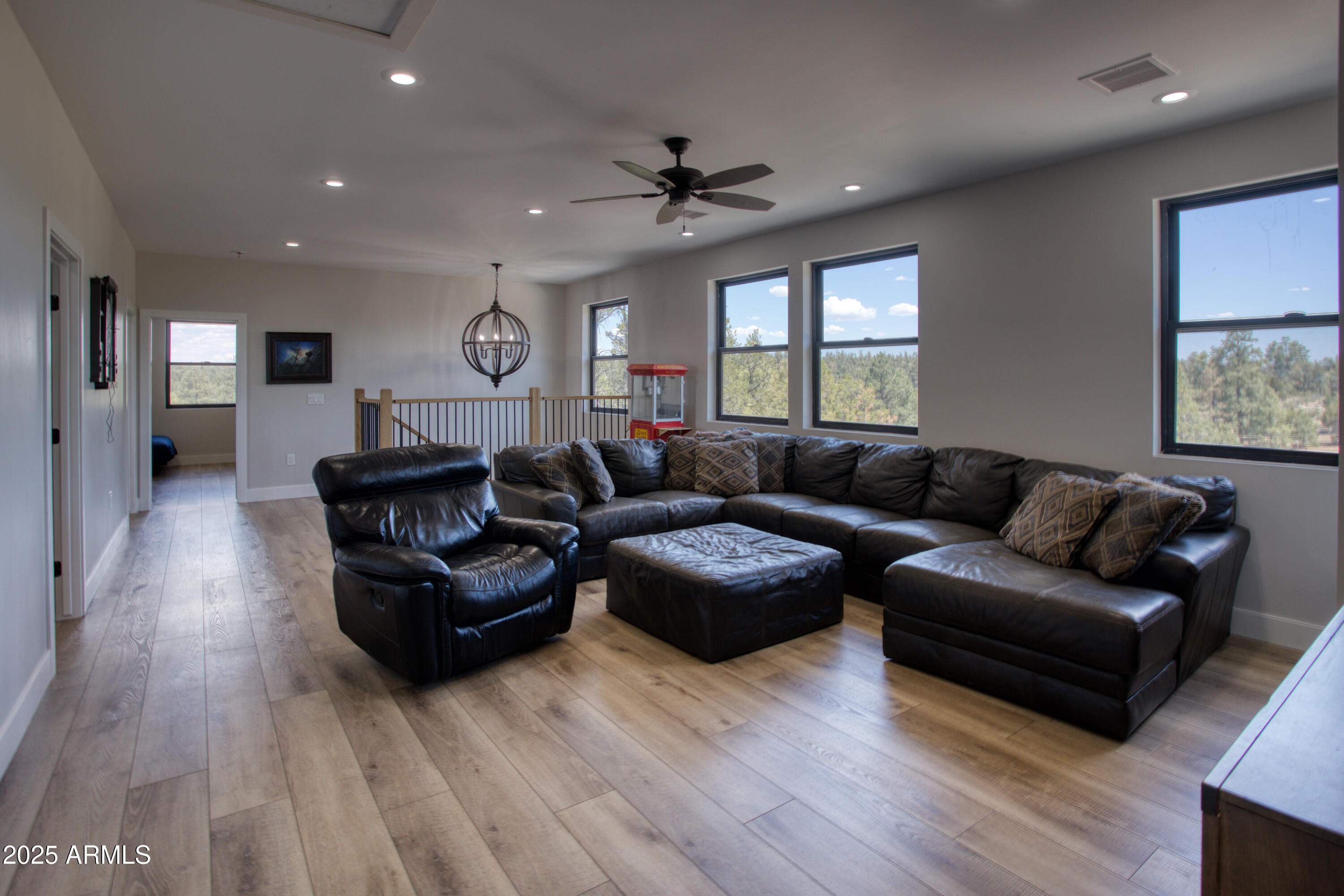 1850 Pinecone Heber, AZ 85928 - Photo 19 of 40 a living room with furniture and a large window