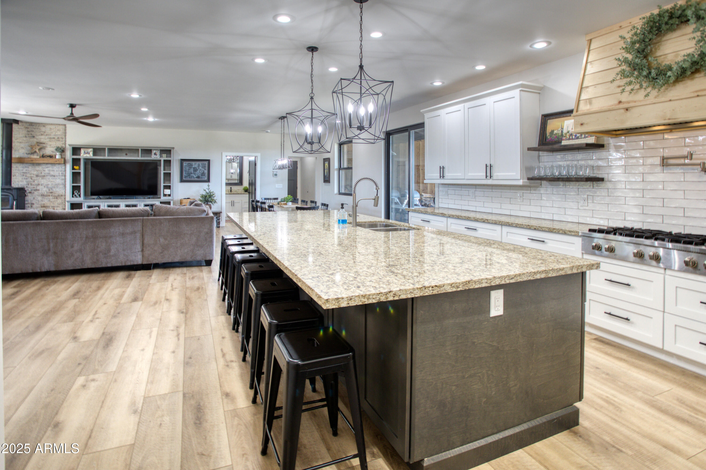 1850 Pinecone Heber, AZ 85928 - Photo 2 of 40 a large kitchen with kitchen island a sink table and chairs