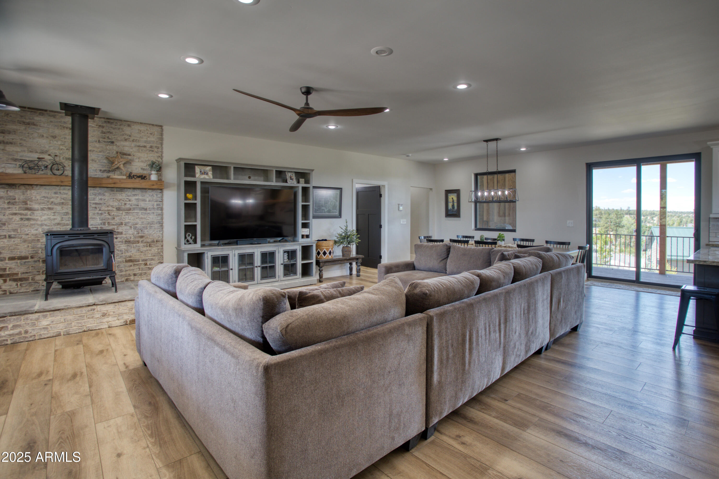 1850 Pinecone Heber, AZ 85928 - Photo 3 of 40 a living room with furniture and a flat screen tv