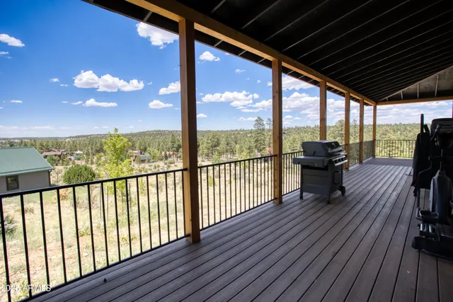 a view of a balcony with chairs
