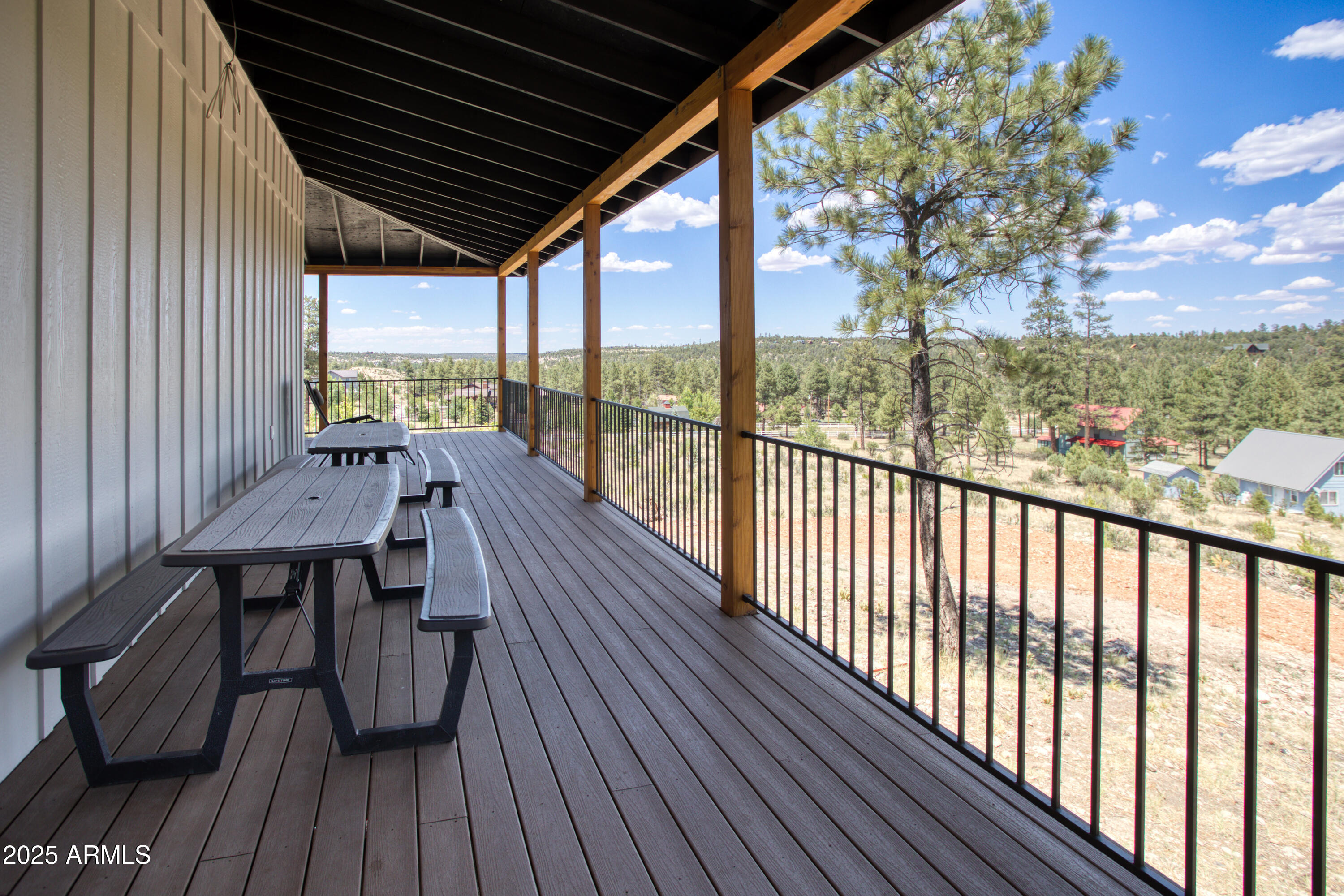 1850 Pinecone Heber, AZ 85928 - Photo 36 of 40 a view of balcony with wooden floor and outdoor seating