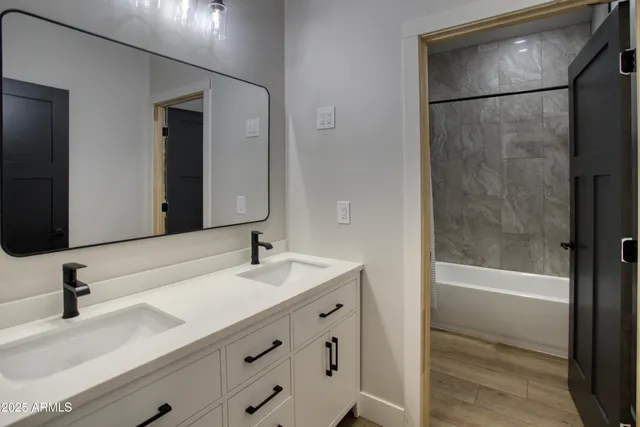 a kitchen with granite countertop stainless steel appliances and cabinets