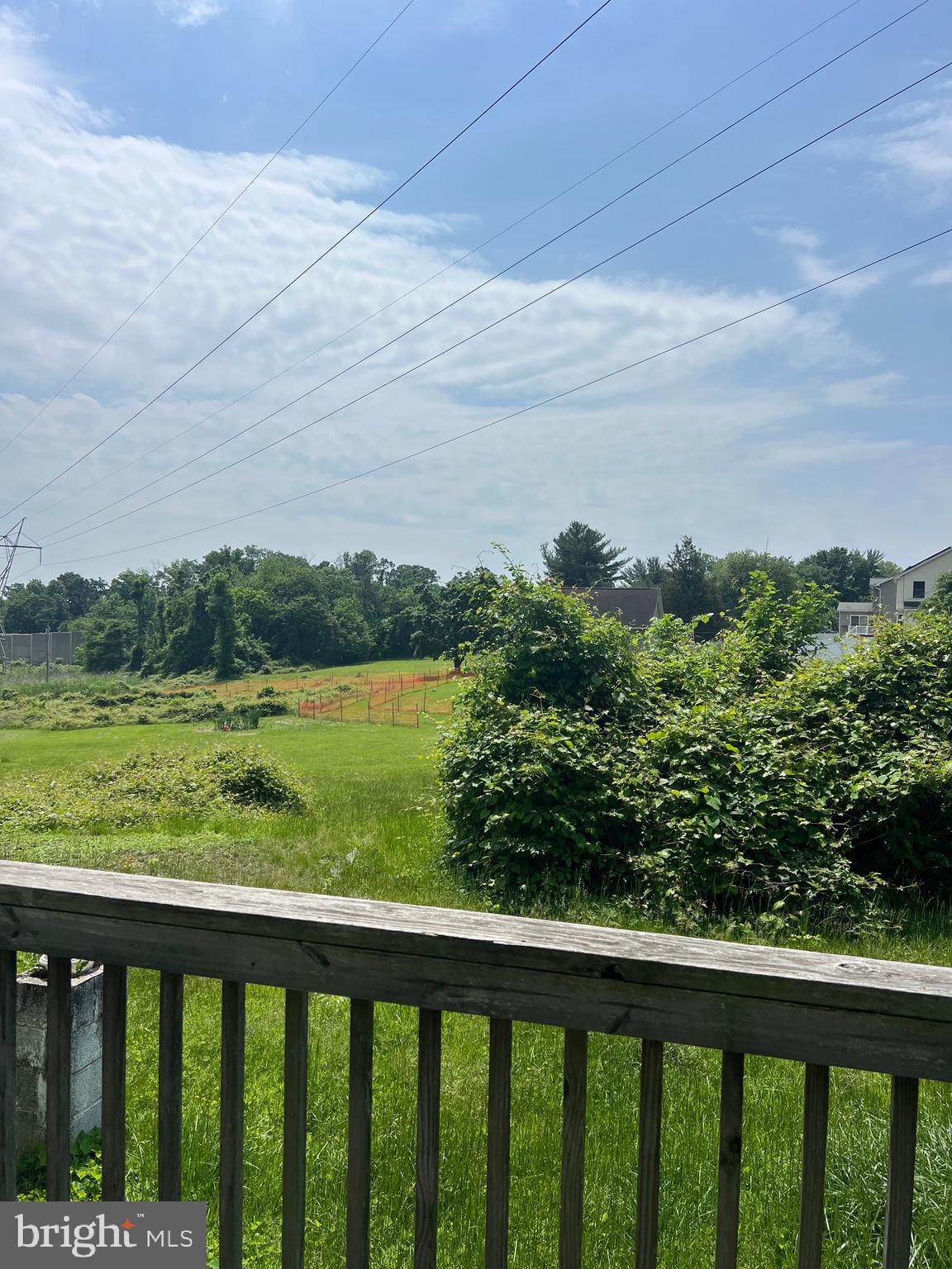 6860 Montgomery Road Elkridge, MD 21075 - Photo 5 of 7 a view of a green field with an ocean view