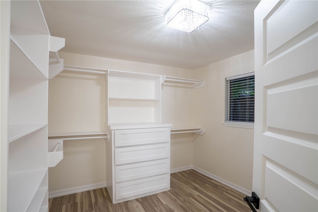 1906 Oak Ridge Drive Portland, TX 78374 - Photo 13 of 20 a view of walk in closet with empty racks