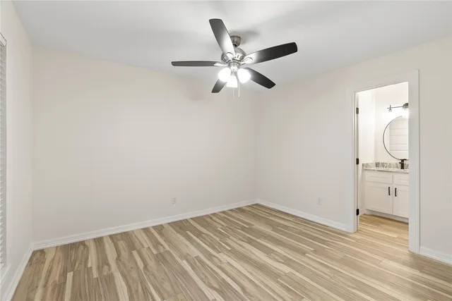 a view of a livingroom with wooden floor