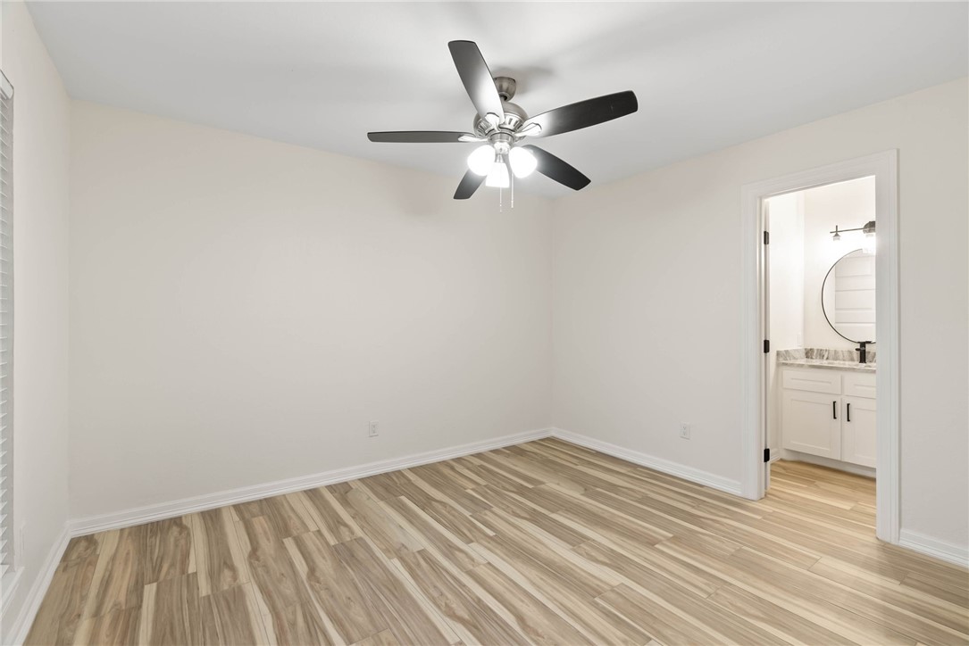 1906 Oak Ridge Drive Portland, TX 78374 - Photo 14 of 20 a view of a livingroom with wooden floor