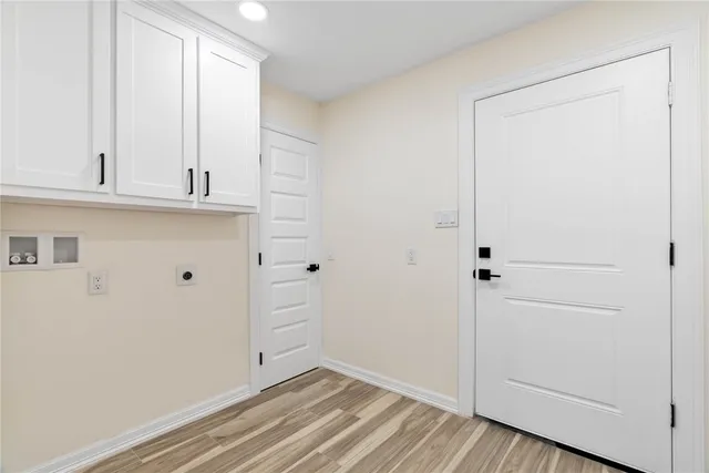 a view of room with hardwood floor