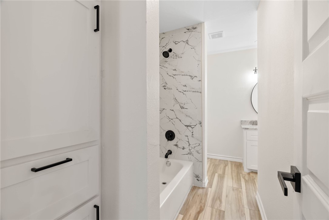 1906 Oak Ridge Drive Portland, TX 78374 - Photo 8 of 20 a bathroom with a bathtub and shower