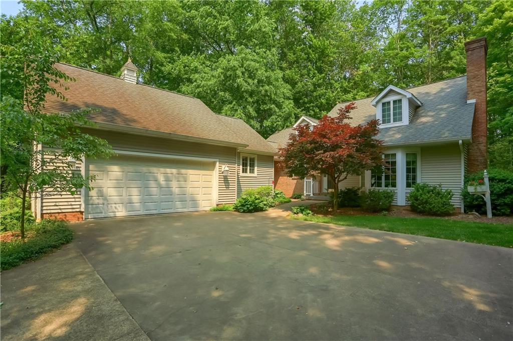 206 Reiber Road Renfrew, PA 16053 - Photo 1 of 43 a view of a house with a yard and large tree