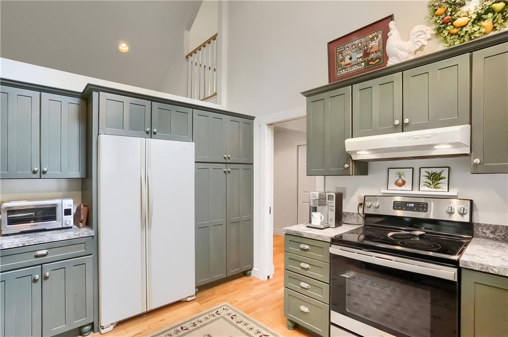 206 Reiber Road Renfrew, PA 16053 - Photo 18 of 43 a kitchen with a stove and a refrigerator