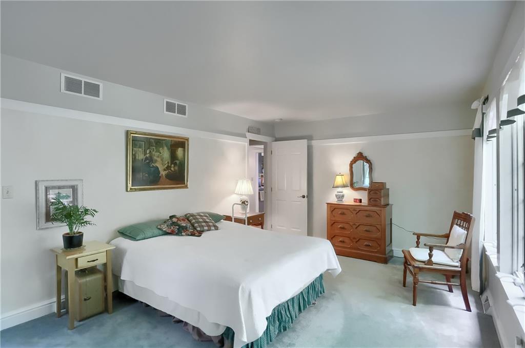 206 Reiber Road Renfrew, PA 16053 - Photo 23 of 43 a bedroom with a bed and a desk
