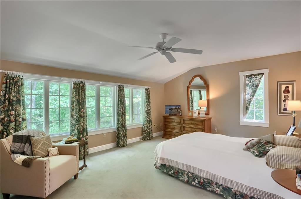 206 Reiber Road Renfrew, PA 16053 - Photo 27 of 43 a bedroom with a bed couch and large window
