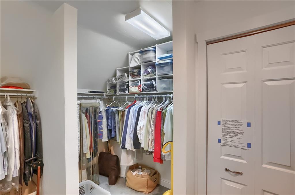 206 Reiber Road Renfrew, PA 16053 - Photo 31 of 43 a view of walk in closet with clothes and shoes
