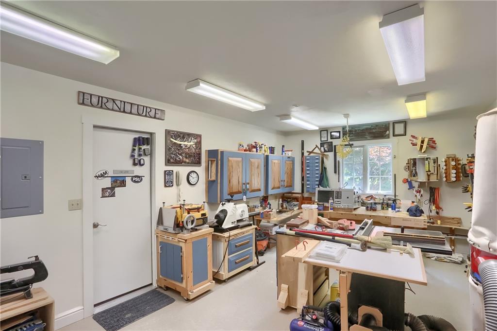 206 Reiber Road Renfrew, PA 16053 - Photo 32 of 43 a room with gym equipment and a large window