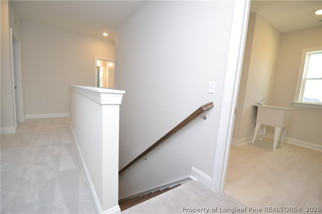 421 Canyon Spring Trail Wake Forest, NC 27587 - Photo 25 of 50 a view of entryway with furniture and wooden floor