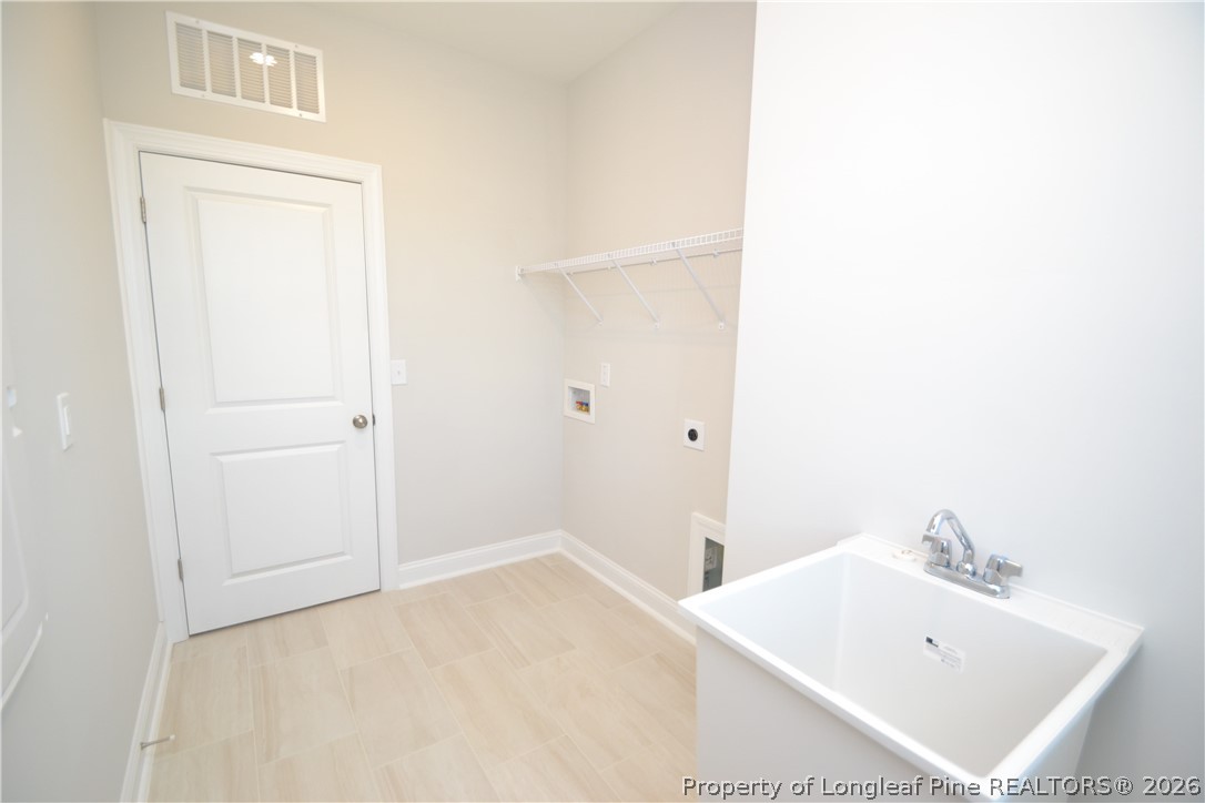 421 Canyon Spring Trail Wake Forest, NC 27587 - Photo 27 of 50 a bathroom with a sink and a mirror