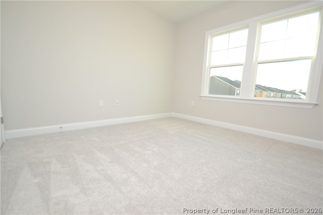 421 Canyon Spring Trail Wake Forest, NC 27587 - Photo 30 of 50 an empty room with a window
