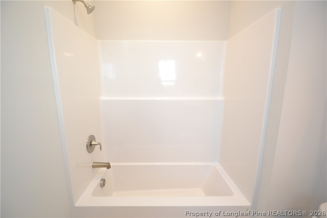 421 Canyon Spring Trail Wake Forest, NC 27587 - Photo 33 of 50 a close up of a bathtub