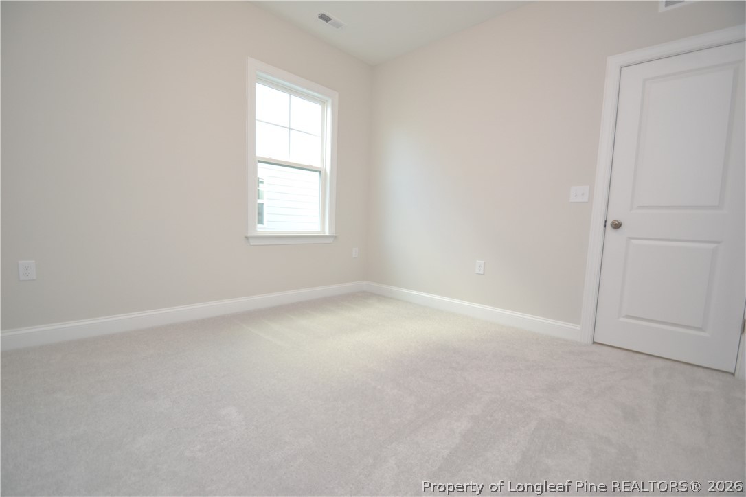 421 Canyon Spring Trail Wake Forest, NC 27587 - Photo 35 of 50 an empty room with a window