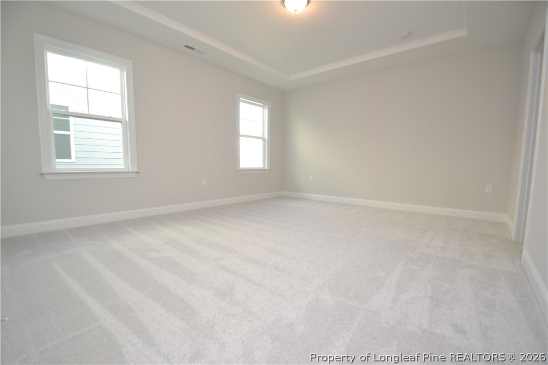 421 Canyon Spring Trail Wake Forest, NC 27587 - Photo 36 of 50 an empty room with a window