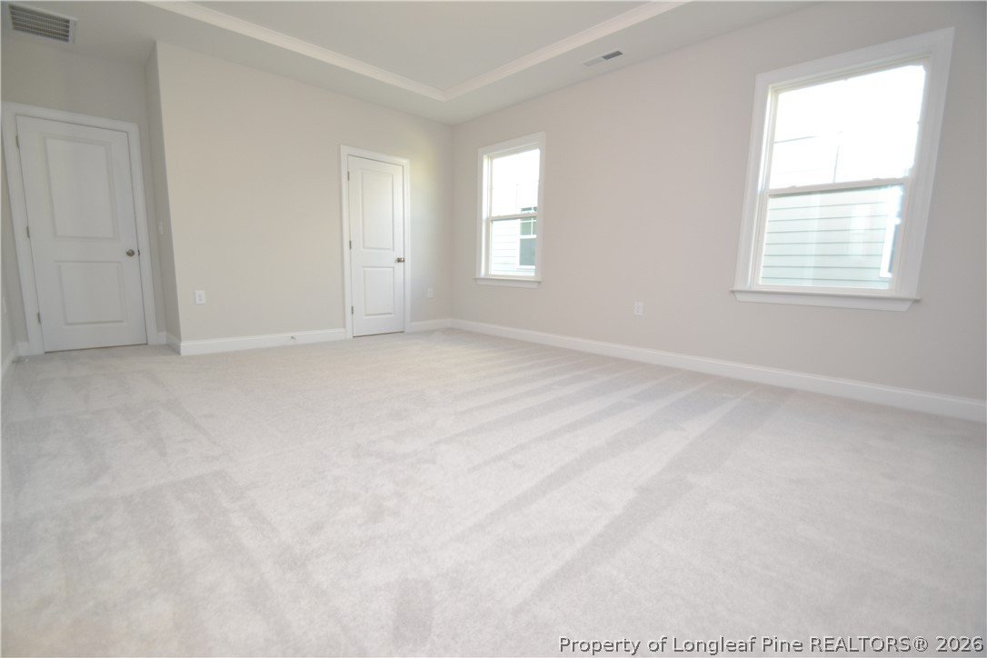 421 Canyon Spring Trail Wake Forest, NC 27587 - Photo 39 of 50 an empty room with windows