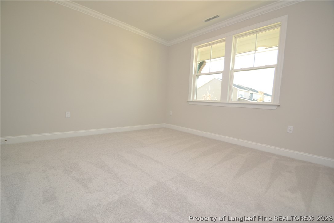 421 Canyon Spring Trail Wake Forest, NC 27587 - Photo 8 of 50 an empty room with a window