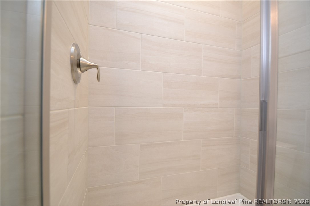 421 Canyon Spring Trail Wake Forest, NC 27587 - Photo 10 of 50 a bathroom with a shower