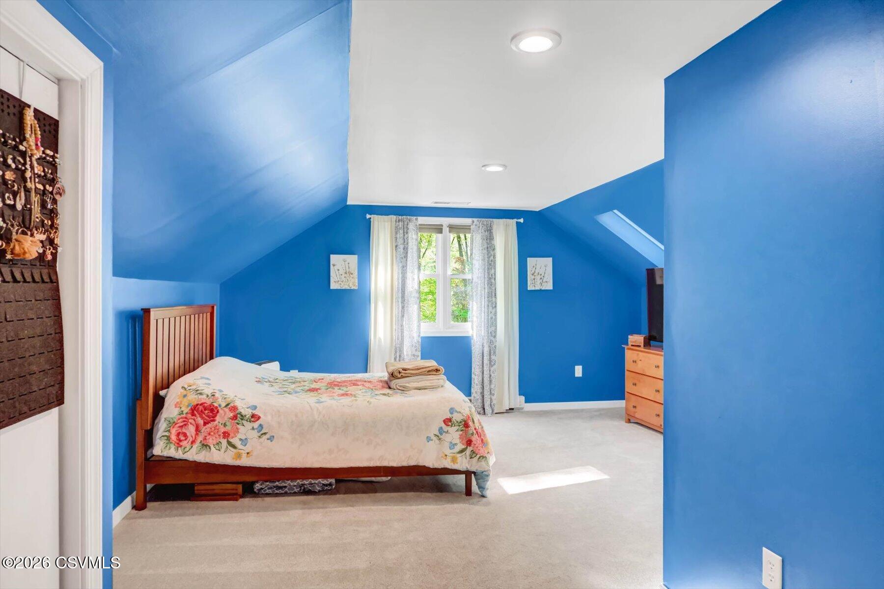 65 Crestview Drive Winfield, PA 17889 - Photo 32 of 70 a bedroom with a large bed and a window