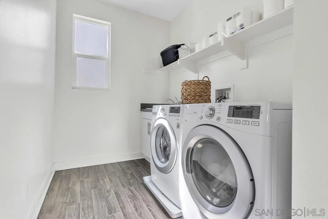 8844 Weston Road Santee, CA 92071 - Photo 20 of 48 a utility room with dryer and washer