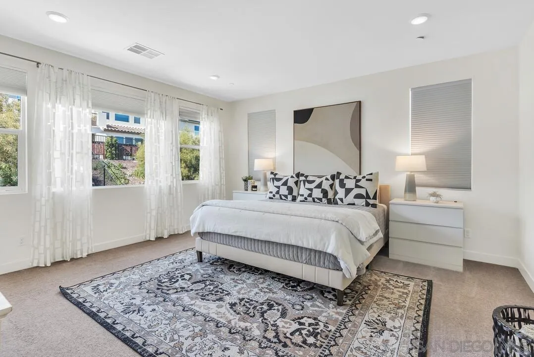 8844 Weston Road Santee, CA 92071 - Photo 25 of 48 a bedroom with a bed and a window