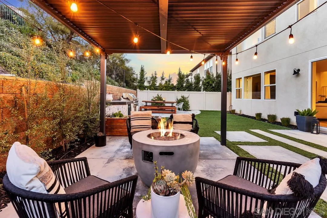 8844 Weston Road Santee, CA 92071 - Photo 34 of 48 a balcony with table and chairs