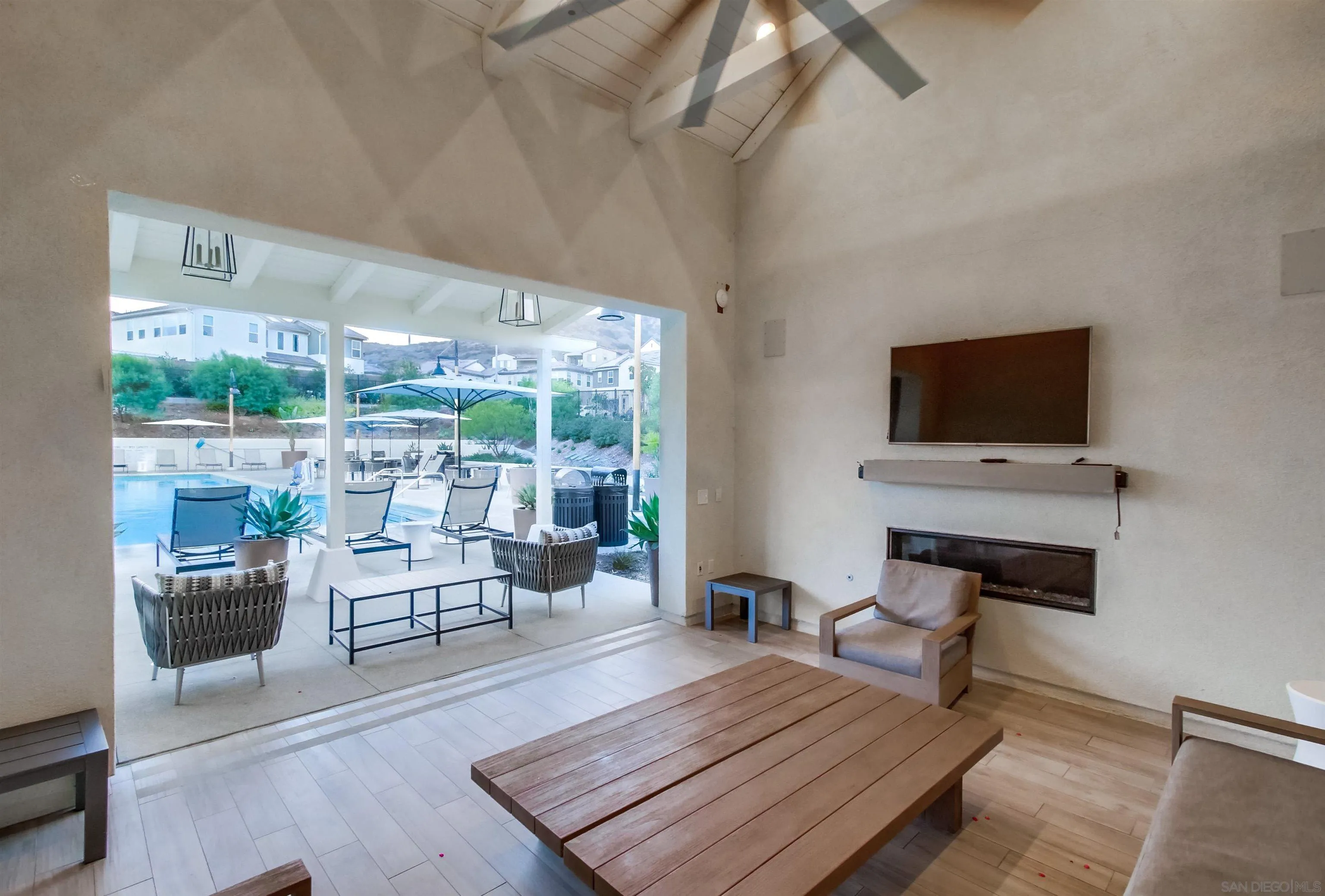 8844 Weston Road Santee, CA 92071 - Photo 44 of 48 a living room with furniture and a flat screen tv