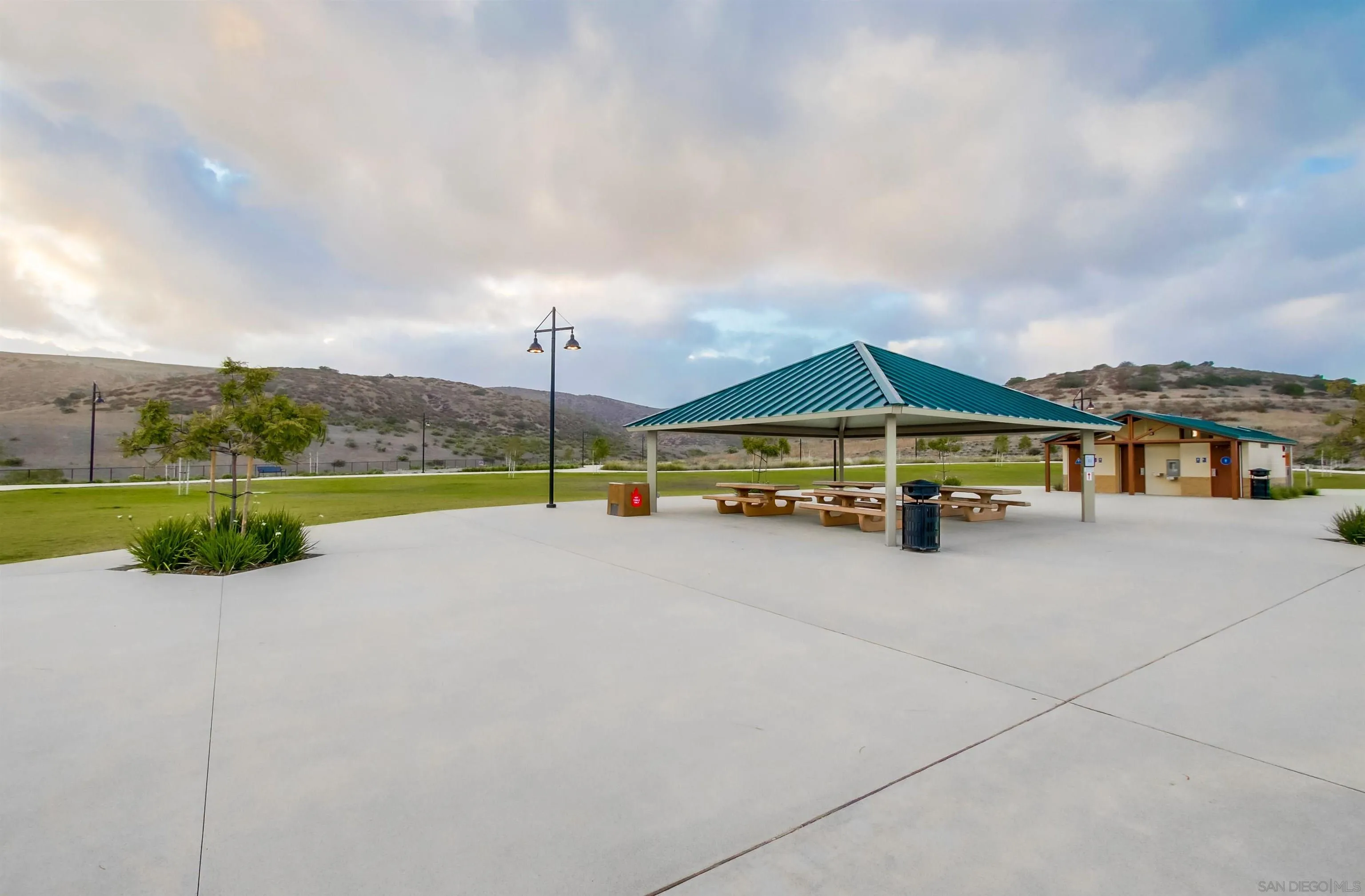 8844 Weston Road Santee, CA 92071 - Photo 47 of 48 a view of swimming pool with lawn chairs and large trees