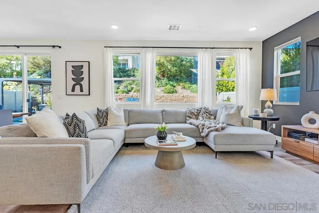 8844 Weston Road Santee, CA 92071 - Photo 5 of 48 a living room with furniture and large windows