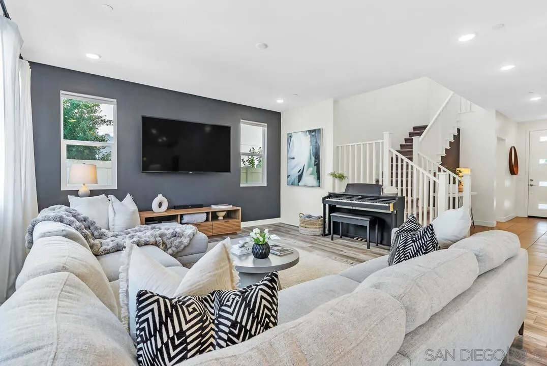 8844 Weston Road Santee, CA 92071 - Photo 6 of 48 a living room with furniture and a flat screen tv