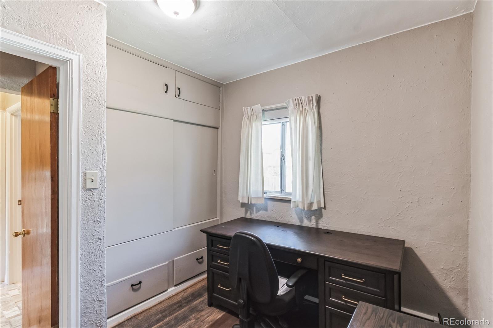 2435 South Race Street Denver, CO 80210 - Photo 24 of 33 a room with storage and utility