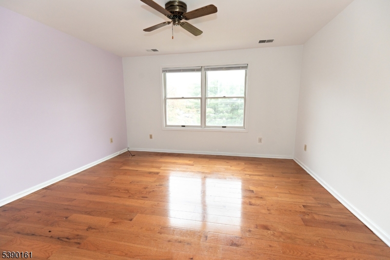 7 Emmet Avenue, Unit D Morristown, NJ 07960 - Photo 14 of 26 an empty room with a window