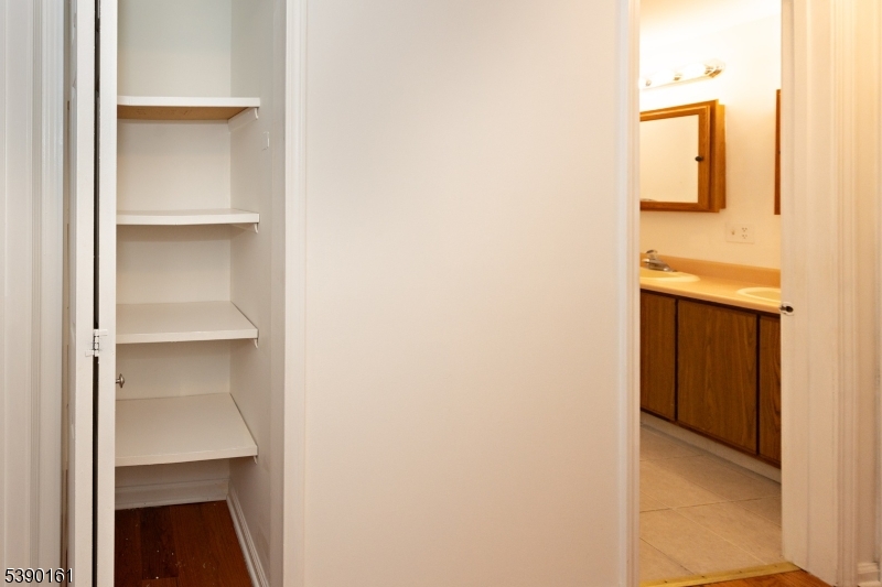 7 Emmet Avenue, Unit D Morristown, NJ 07960 - Photo 15 of 26 a view of walk in closet with empty racks