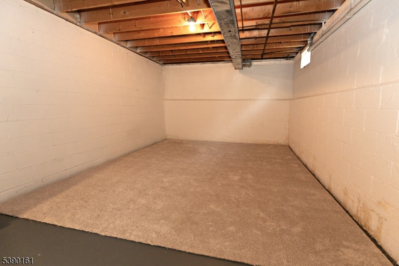 7 Emmet Avenue, Unit D Morristown, NJ 07960 - Photo 20 of 26 a view of a room with racks on the wall