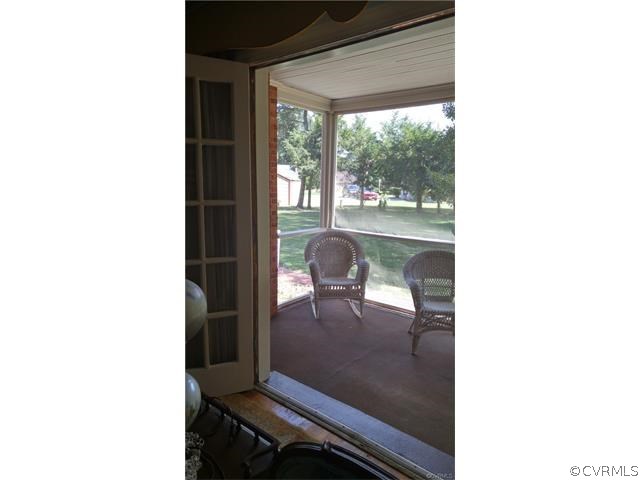 303 North Wilkinson Road Richmond, VA 23227 - Photo 8 of 20 French Doors off Living Room lead to Screened In R