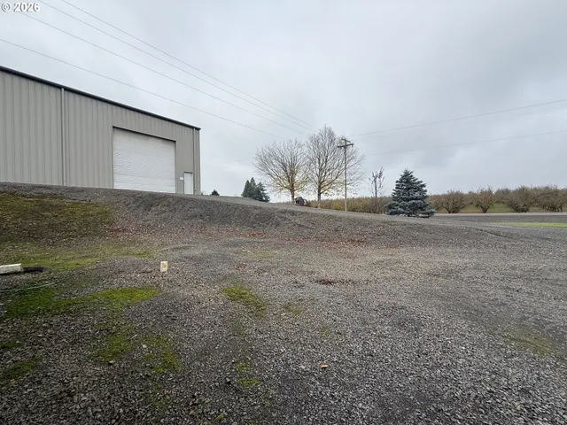 a view of an empty room with gym equipment