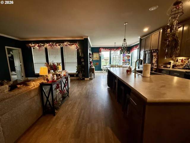 a spacious bathroom with a sink double vanity granite and a shower