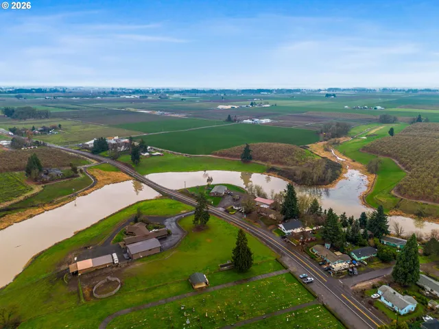 an aerial view of a city with lake view