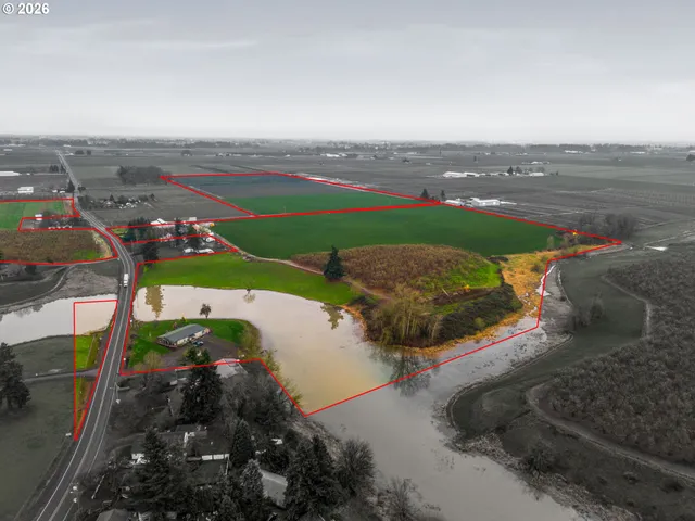 an aerial view of a houses with outdoor space