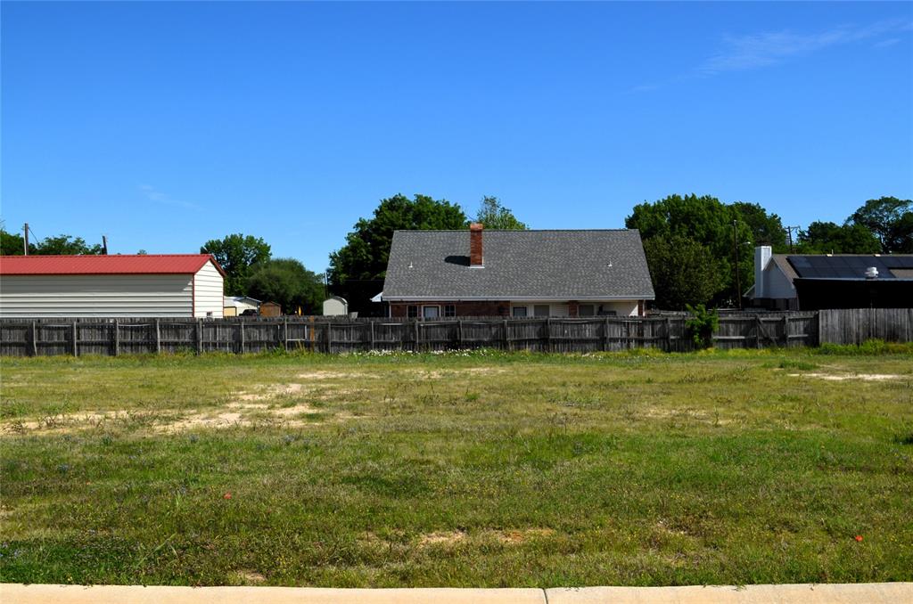 310 Preston Road Mabank, TX 75147 - Photo 2 of 3 a view of a swimming pool with seating area and a mountain view