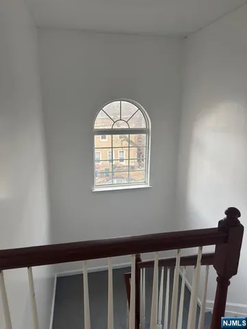 a view of wooden floor in a bedroom