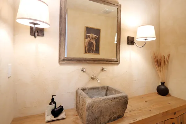 a view of a terrace with furniture and a mountain view