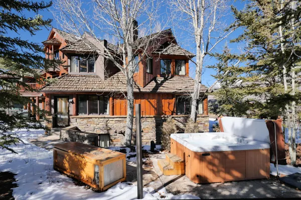 a living room with furniture and large window
