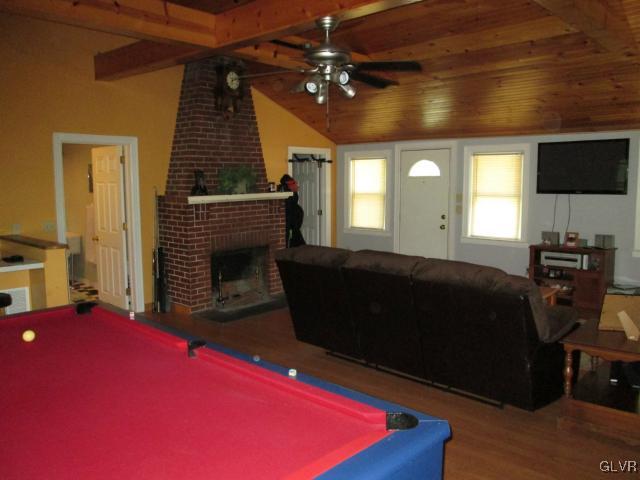 2208 Hillside Road Slatington, PA 18080 - Photo 4 of 10 a bedroom with a bed and a television